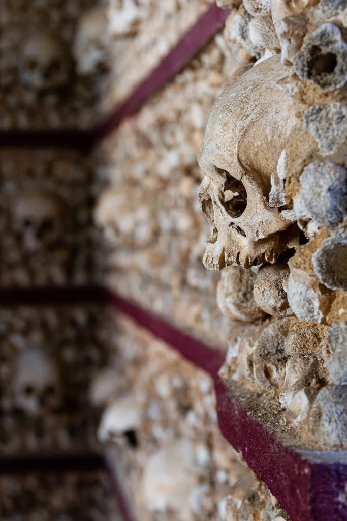 Capela dos Ossos, chapel of bones inside interior, skulls and bones wall